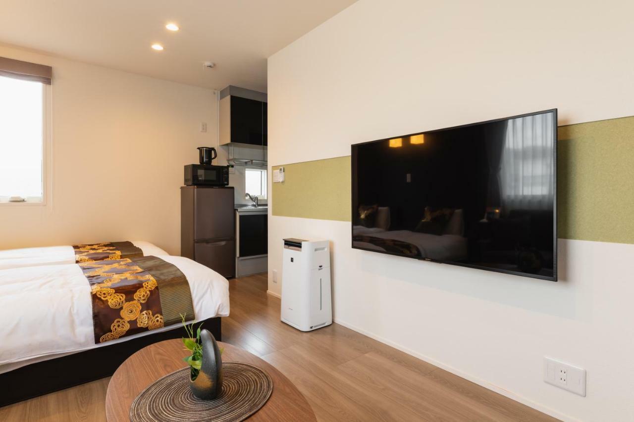 Ambicia Sasebo Aparthotel Bagian luar foto